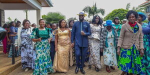 Gerald Bitok, holds bride Mercy's hand alongside Mama Rachel Ruto on Saturday July 20, 2024